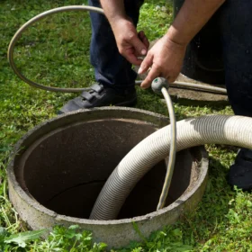 Worker performing septic repair services