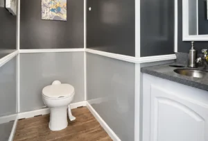 private restroom trailer stall with sink